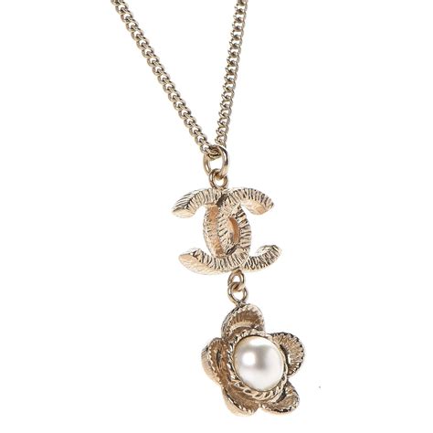 chanel gold flower necklace|cost of Chanel pearl necklace.